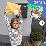 Paula mit Länderbrief in der Hand